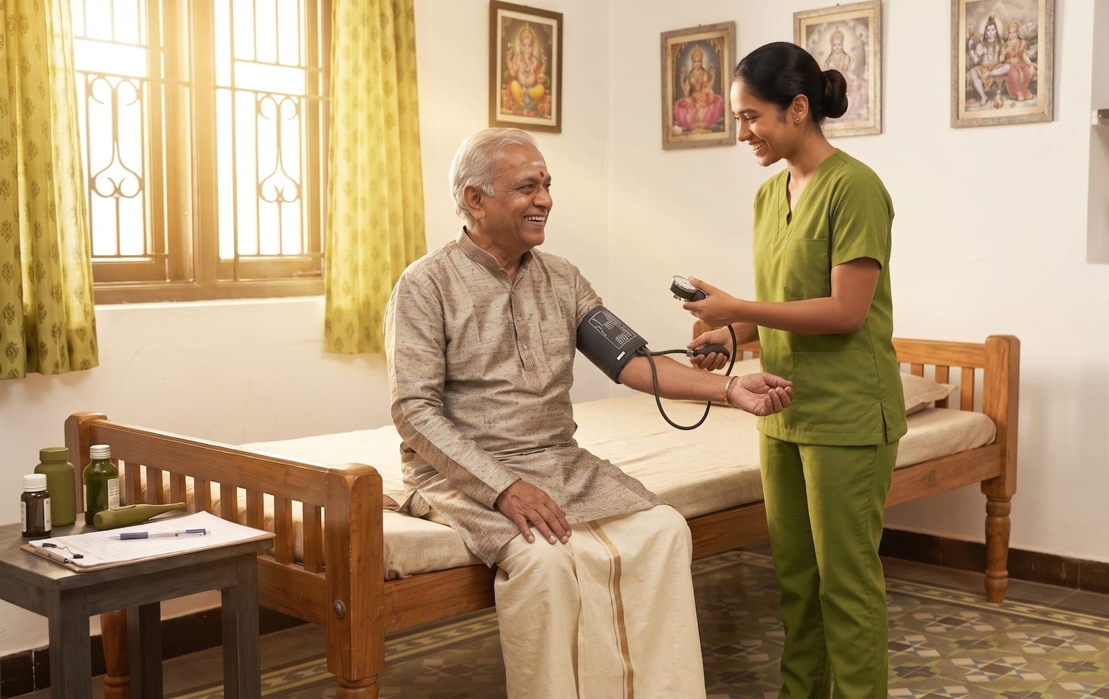 Nurse checking a senior man's blood pressure at home